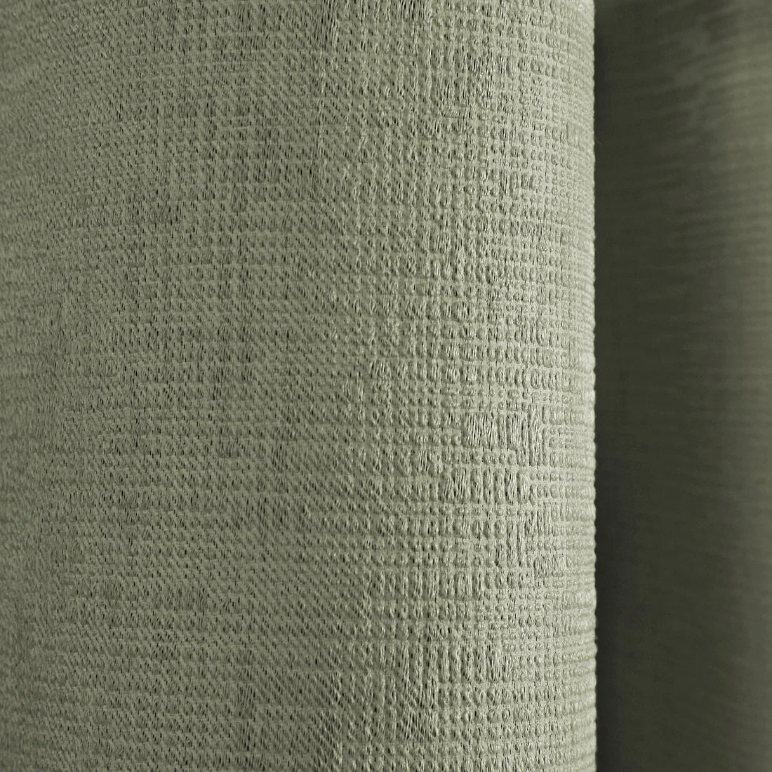 Close-up of the soft-touch semi-plain fabric on the Fusion Strata eyelet curtains.