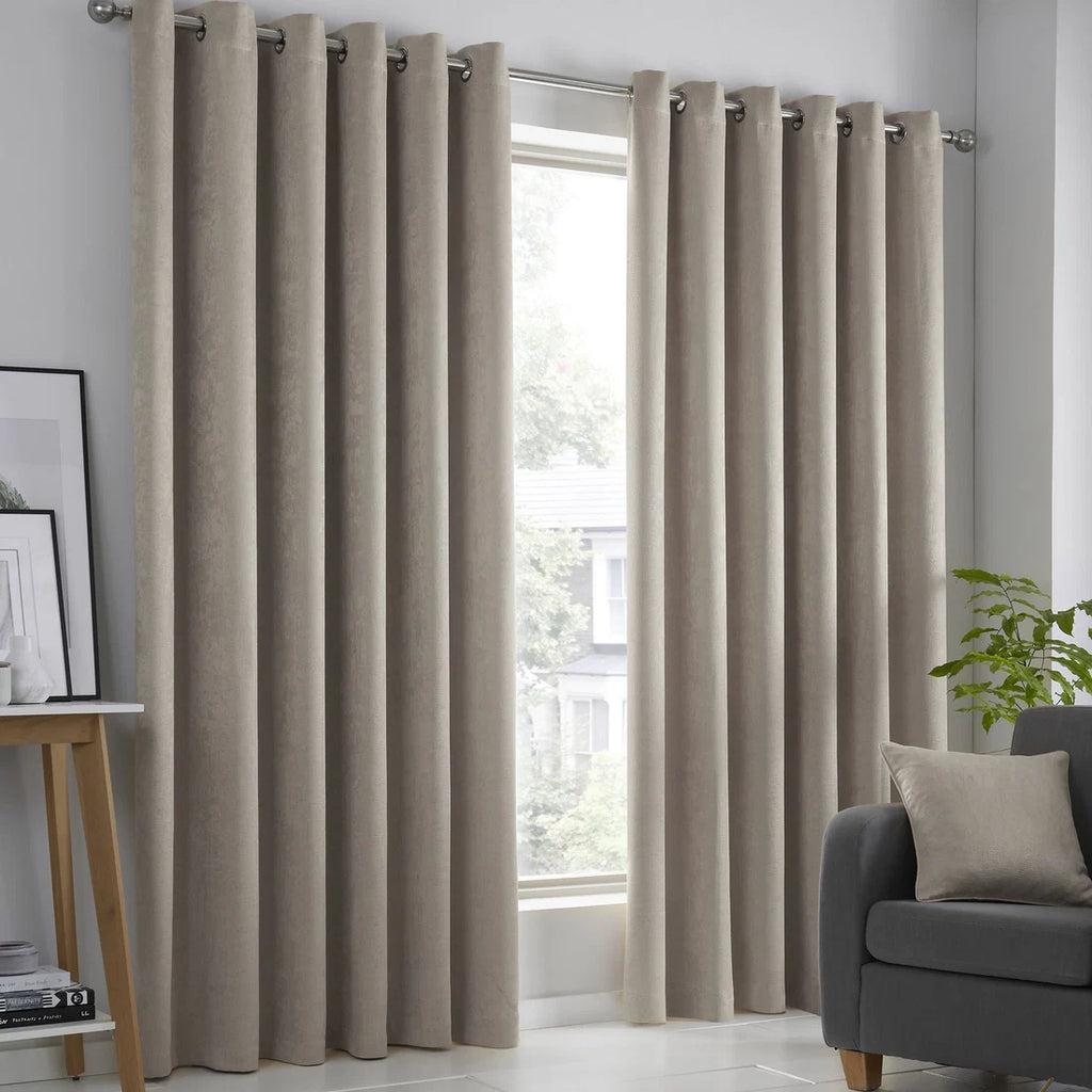 Fusion Strata dim-out eyelet curtains in natural.