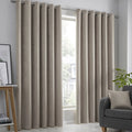 Fusion Strata dim-out eyelet curtains in natural.