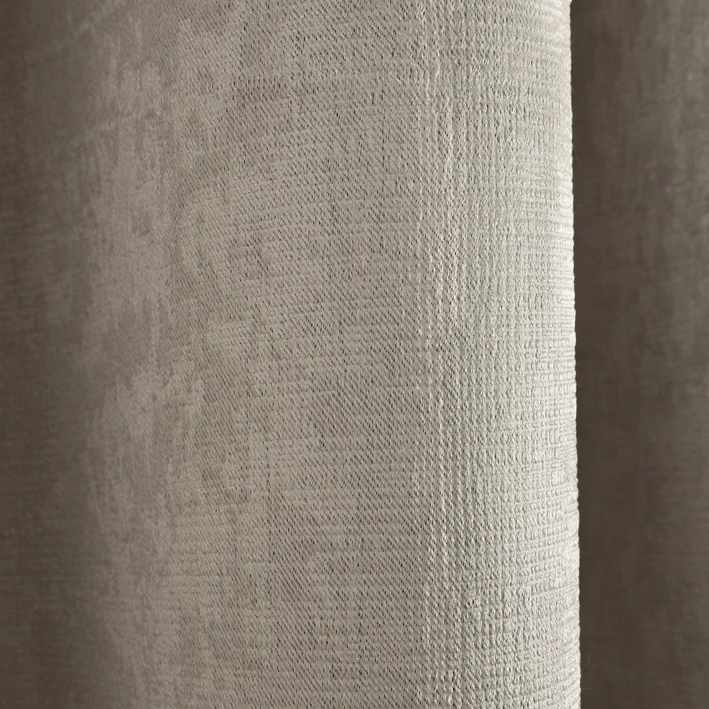 Close-up of the semi-plain textured fabric on the Fusion Strata eyelet curtains.