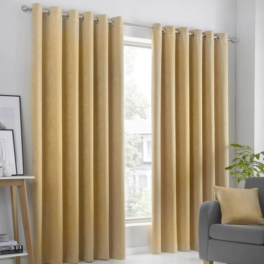 Fusion Strata dim-out eyelet curtains in ochre.