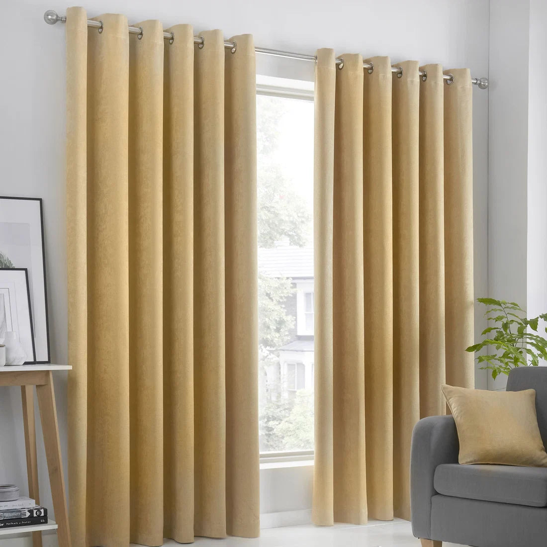 Fusion Strata dim-out eyelet curtains in ochre.