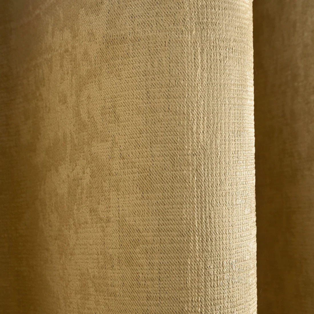 Close-up of the soft-touch semi-plain fabric on the Fusion Strata eyelet curtains.