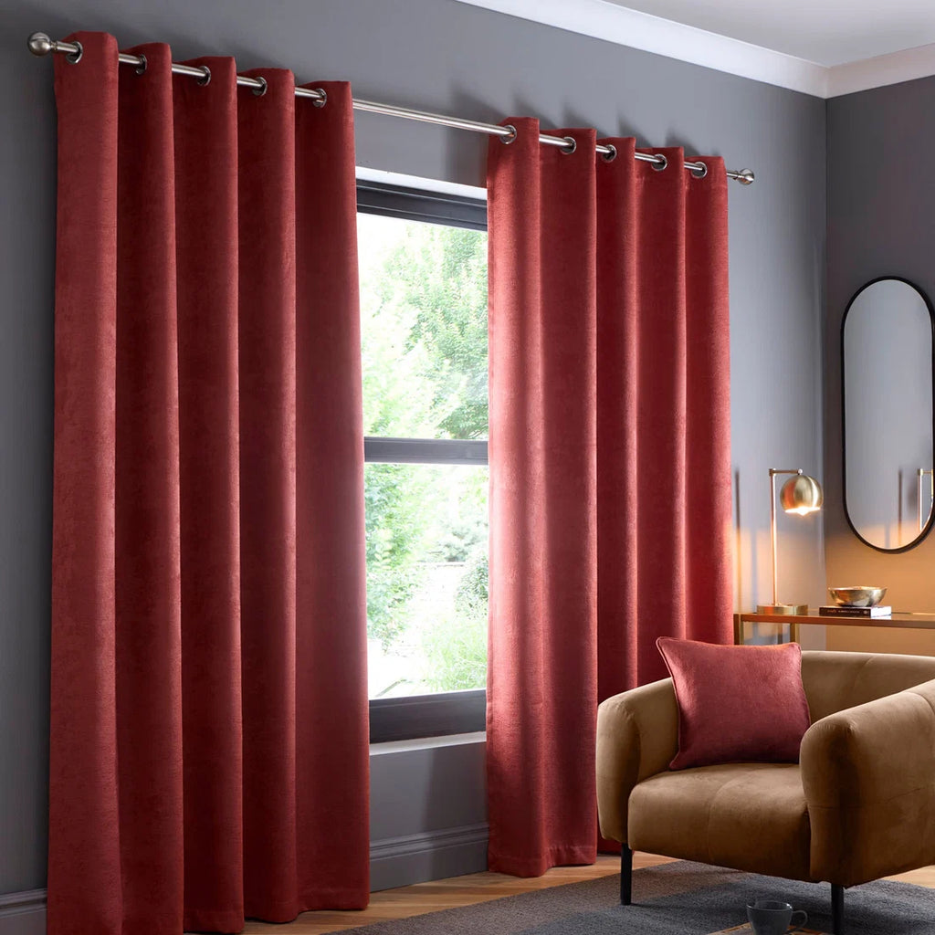 Fusion Strata dim-out eyelet curtains in terracotta.