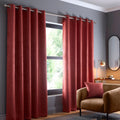 Fusion Strata dim-out eyelet curtains in terracotta.
