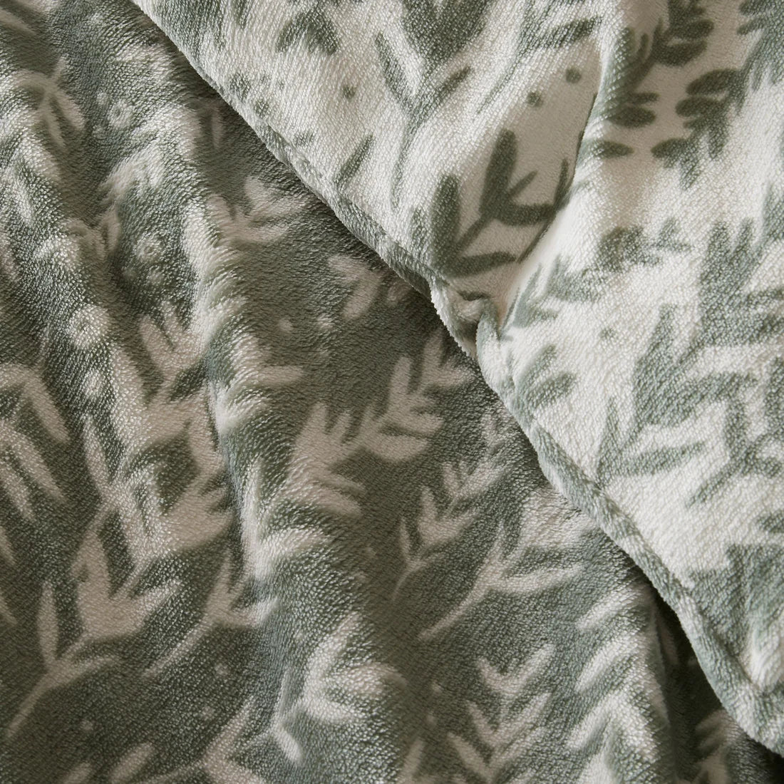 Close-up of the soft polyester fleece fabric on the Fusion Winter Foliage duvet cover set.