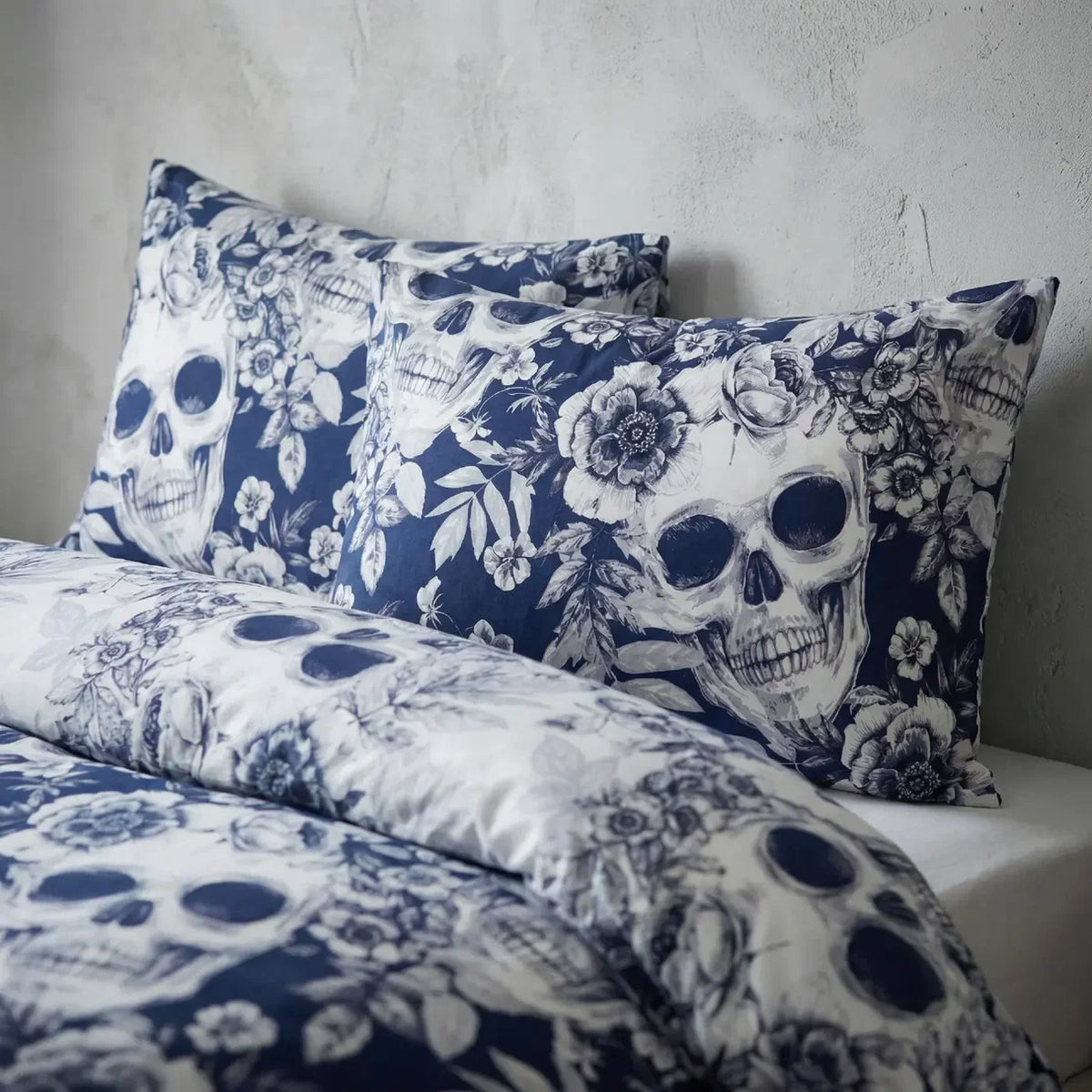 Close-up of the detailed skull and botanical floral pattern on the Gothic Skulls duvet cover set.