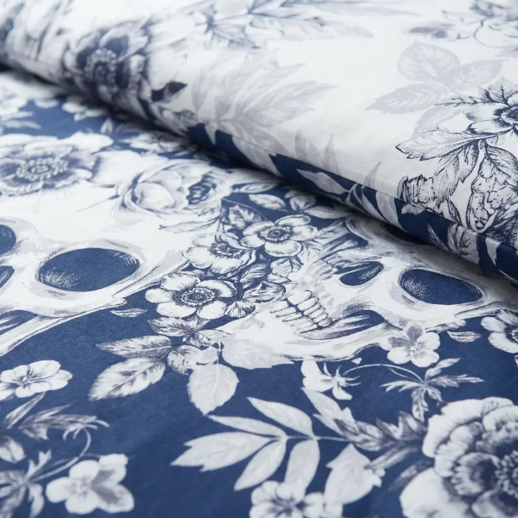 Close-up of the detailed skull and botanical floral pattern on the Gothic Skulls duvet cover set.