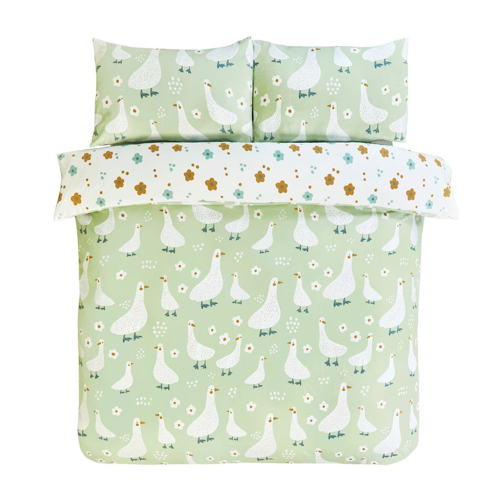 Jemima green duck duvet cover set styled in a cosy country-inspired bedroom.