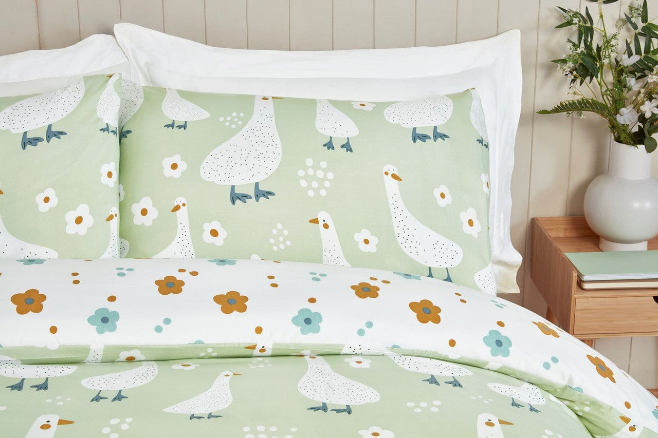 Close-up of the soft microfibre fabric on the Jemima green duck duvet cover set.