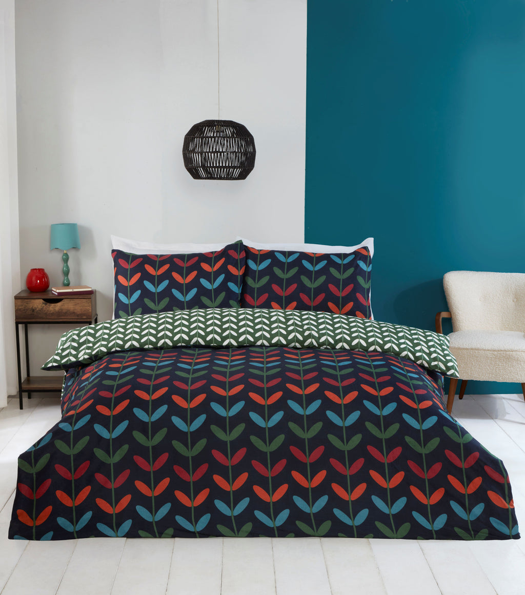 Jules navy duvet cover set styled in a modern bedroom.