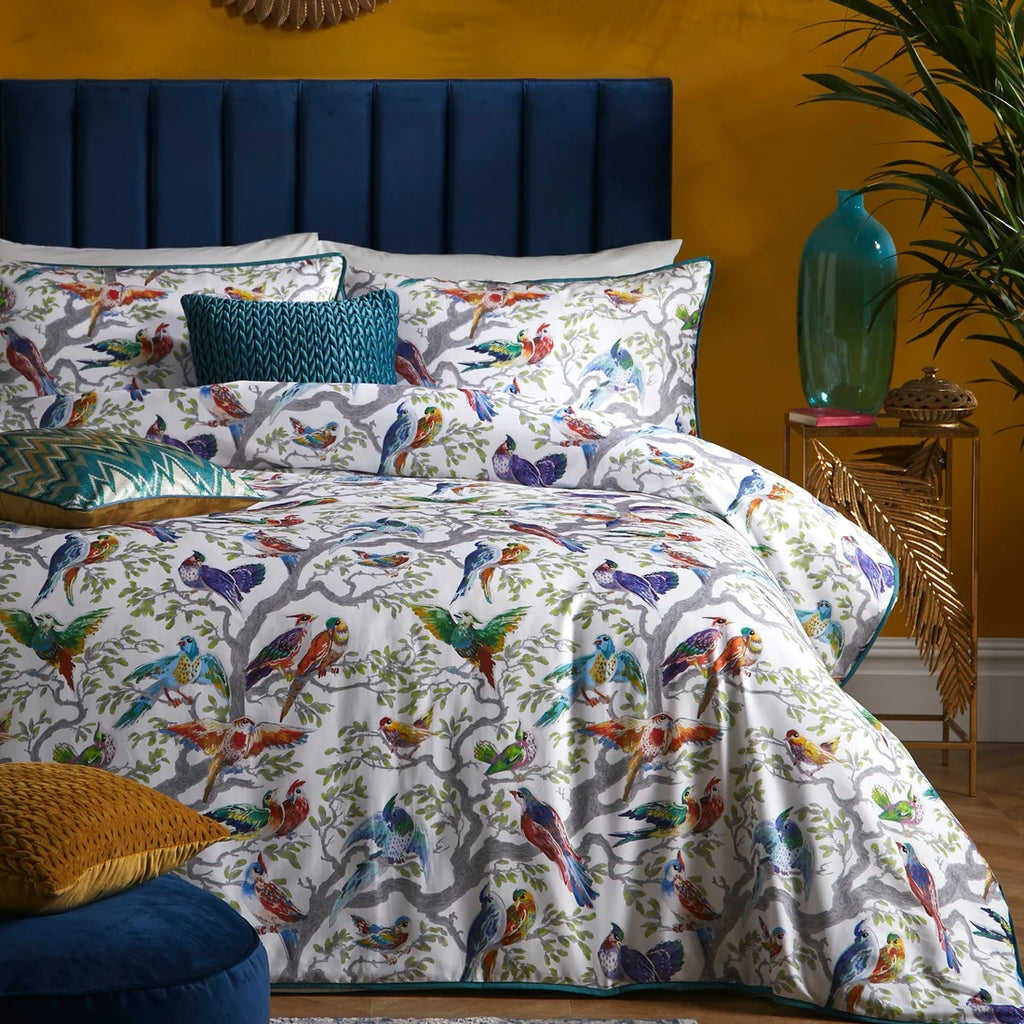 Laurence Llewelyn-Bowen Birdity Absurdity Multicolour duvet cover set styled in a luxurious maximalist bedroom.