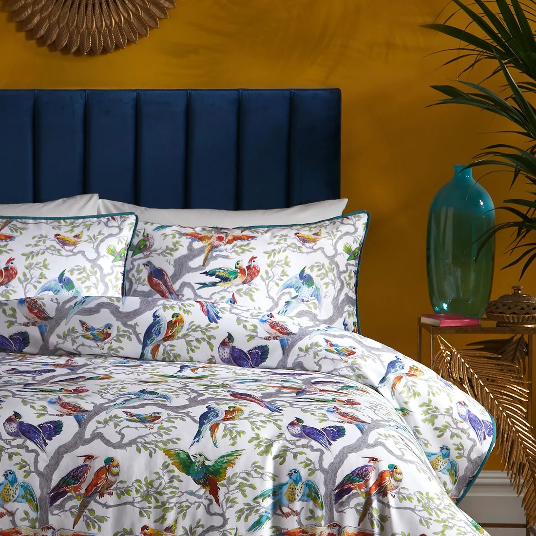 Close-up of the colourful digital print on the Laurence Llewelyn-Bowen Birdity Absurdity bedding.