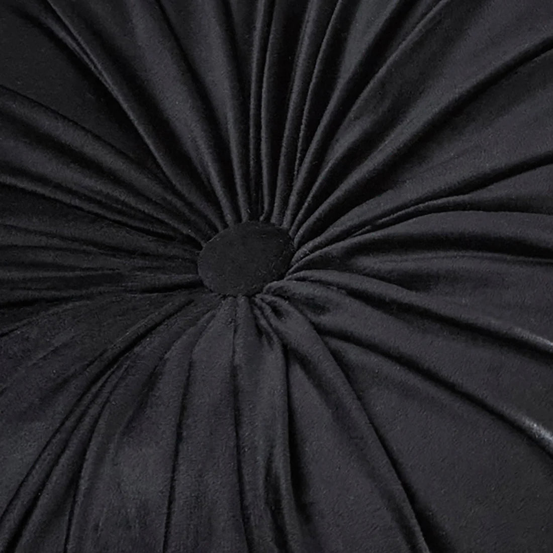 Close-up of the radiating pleat detailing on the Laurence Llewelyn-Bowen Black round cushion.