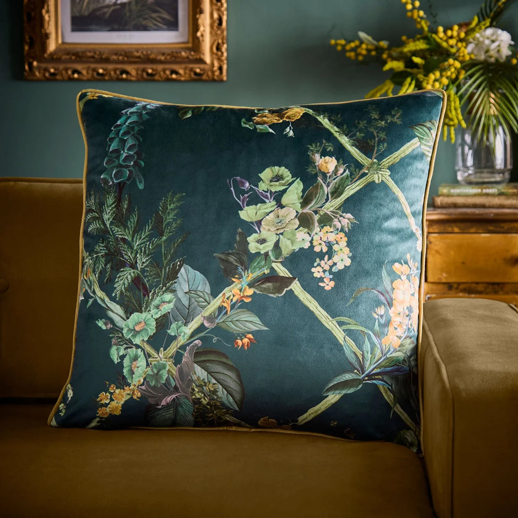 Laurence Llewelyn-Bowen Cotswold Fantasia Dawn velvet cushion in Green 55 x 55cm with a hand-painted floral design.