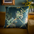 Laurence Llewelyn-Bowen Cotswold Fantasia Dawn velvet cushion in Green 55 x 55cm with a hand-painted floral design.