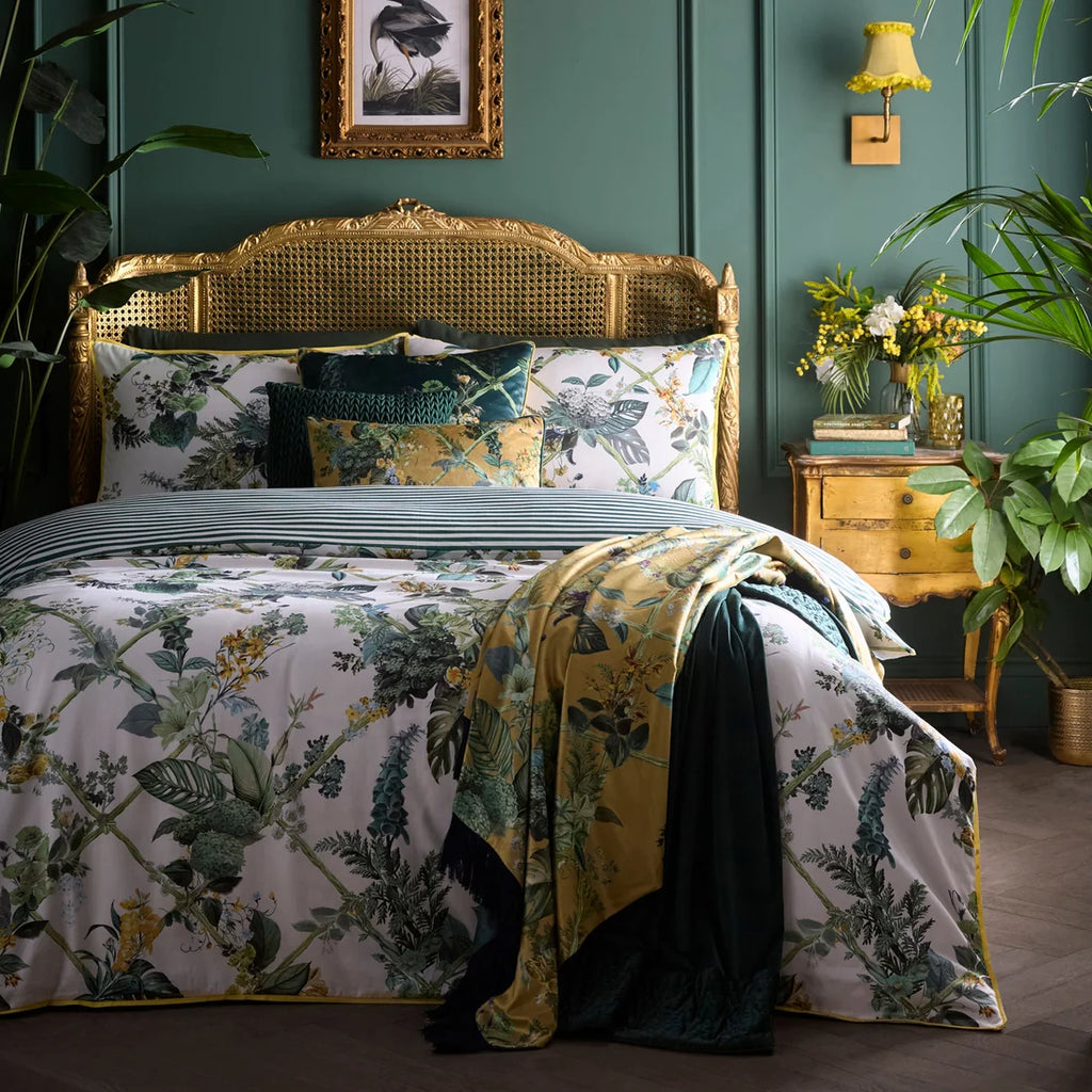 Laurence Llewelyn-Bowen Cotswold Fantasia Green duvet cover set styled in a luxurious bedroom.