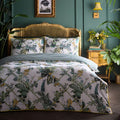 Laurence Llewelyn-Bowen Cotswold Fantasia duvet cover set in Green with a vibrant floral and trellis design.