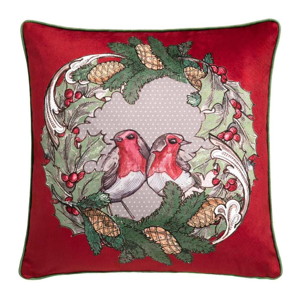 Close-up of the robin, ornate wreath and festive foliage on the Laurence Llewelyn-Bowen Festive Robin cushion.