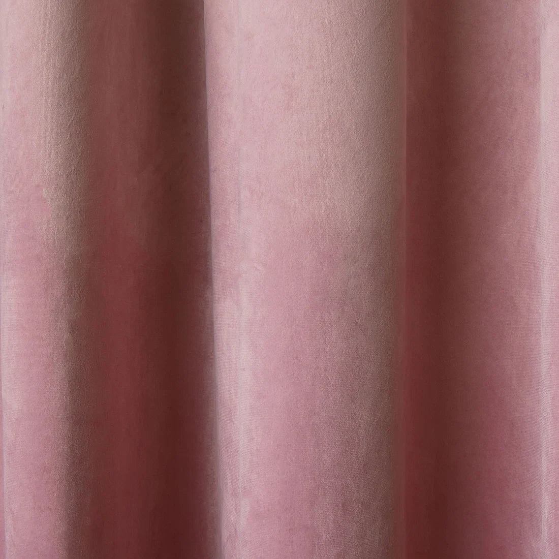 Close-up of the soft blush velvet fabric on the Laurence Llewelyn-Bowen Montrose curtains.