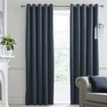 Laurence Llewelyn-Bowen Montrose blackout velvet eyelet curtains in navy.