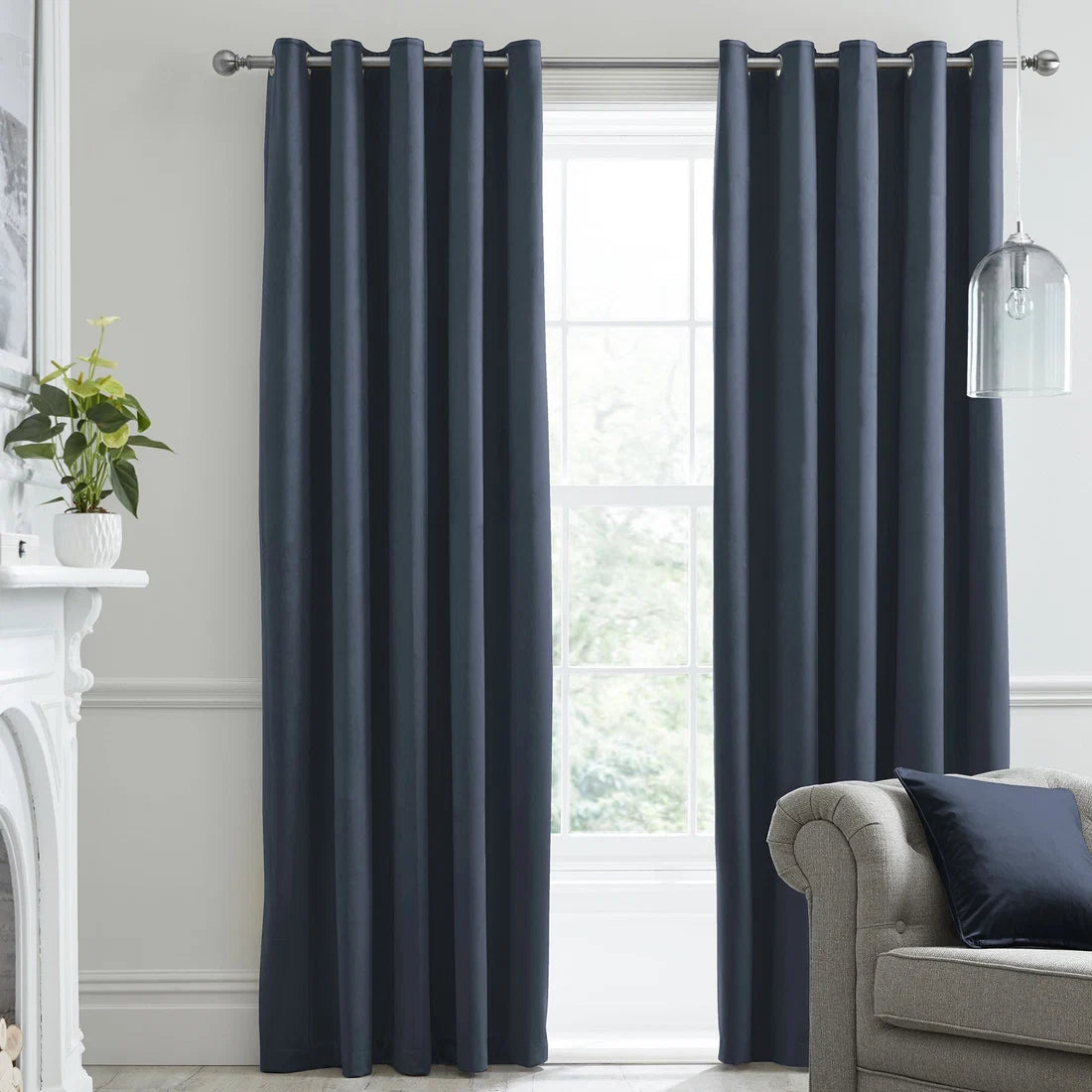 Laurence Llewelyn-Bowen Montrose blackout velvet eyelet curtains in navy.