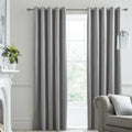 Laurence Llewelyn-Bowen Montrose blackout velvet eyelet curtains in silver.