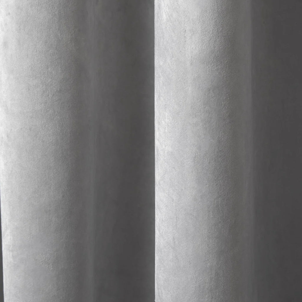 Close-up of the soft silver velvet fabric on the Laurence Llewelyn-Bowen Montrose curtains.