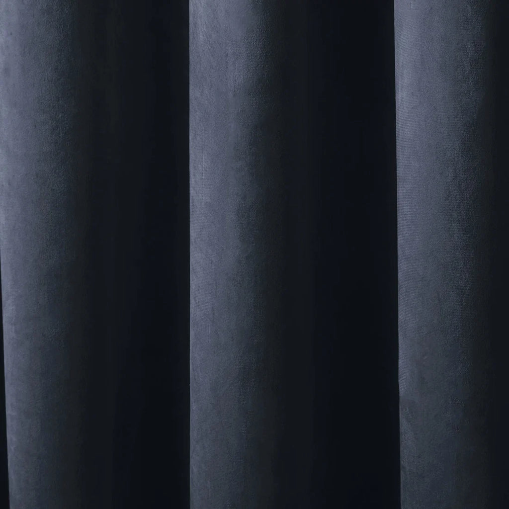 Close-up of the soft navy velvet fabric on the Laurence Llewelyn-Bowen Montrose curtains.