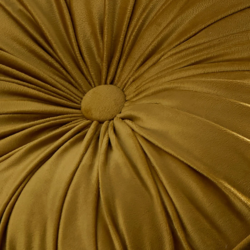 Close-up of the radiating pleat detailing on the Laurence Llewelyn-Bowen Ochre round cushion.