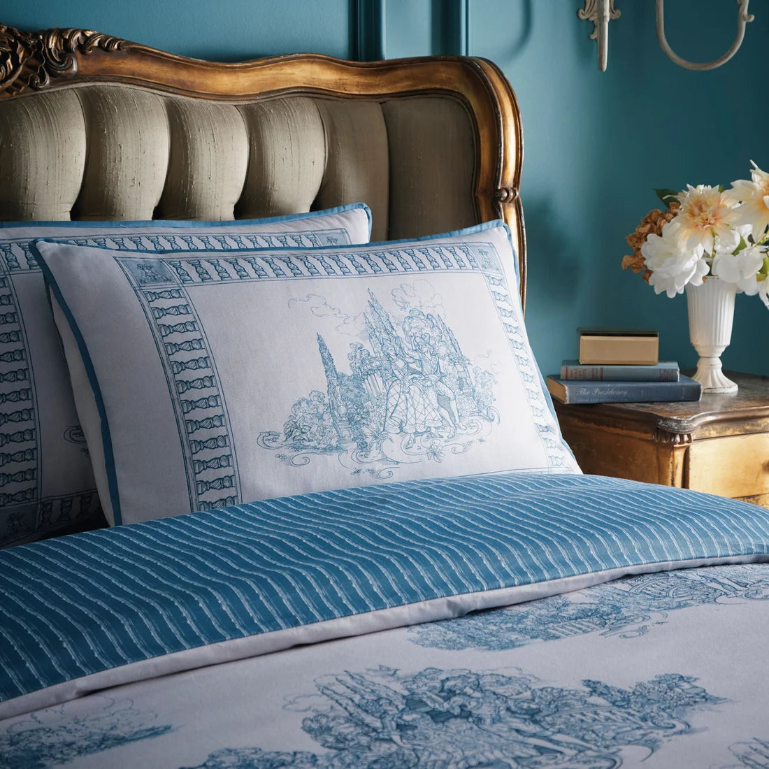 Close-up of the scenic toile artwork on the Laurence Llewelyn-Bowen Tuscan Toile duvet cover set.