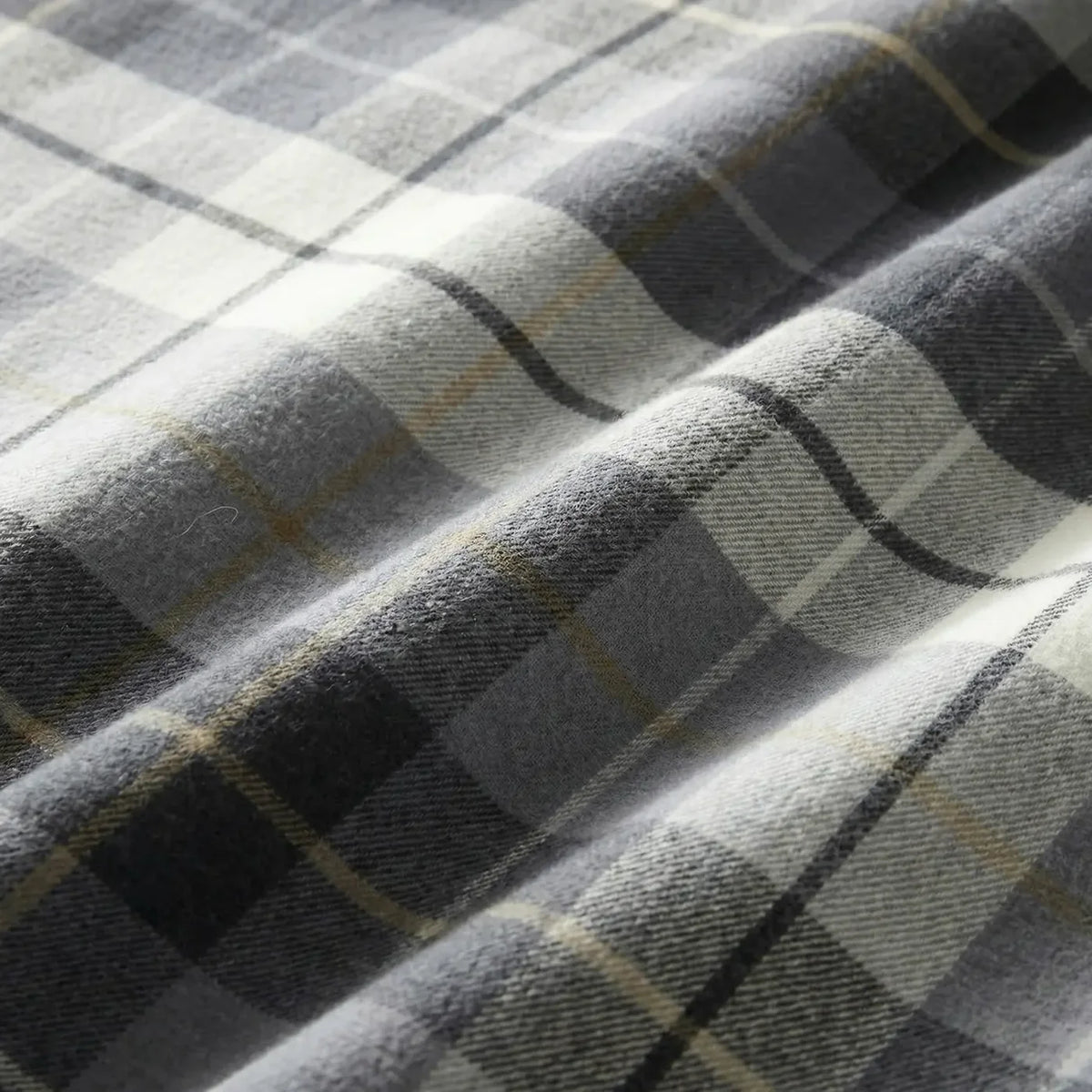 Close-up of the soft 100% brushed cotton fabric on the Lomond Check duvet cover set.