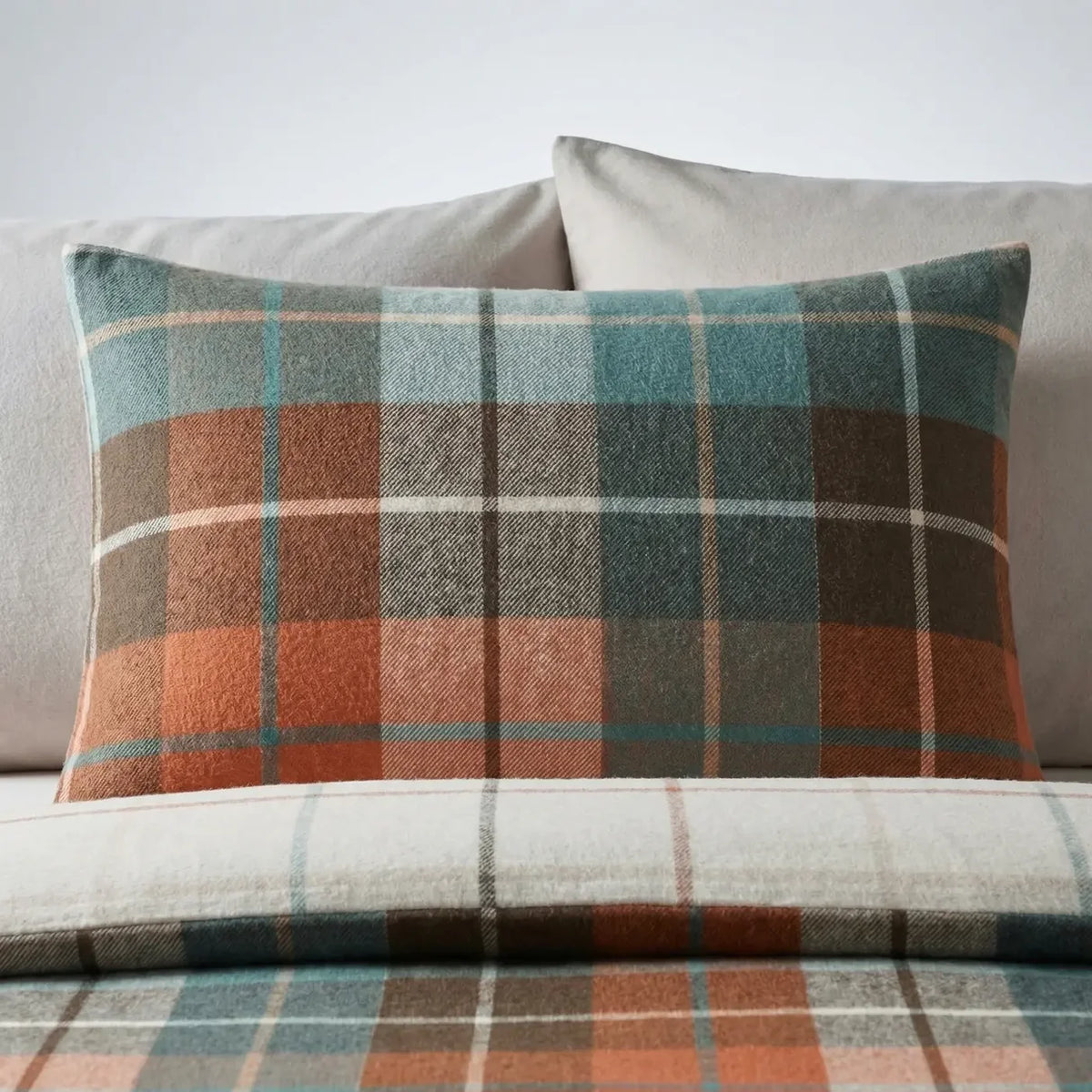 Close-up of the traditional terracotta check pattern on the Lomond brushed cotton duvet cover set.