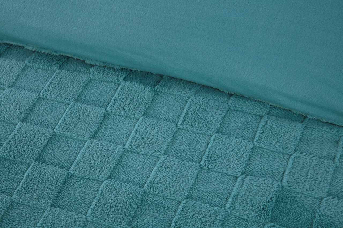 Close-up of the raised checkerboard texture on the Luxury Check Teddy duvet cover set in Duck Egg.