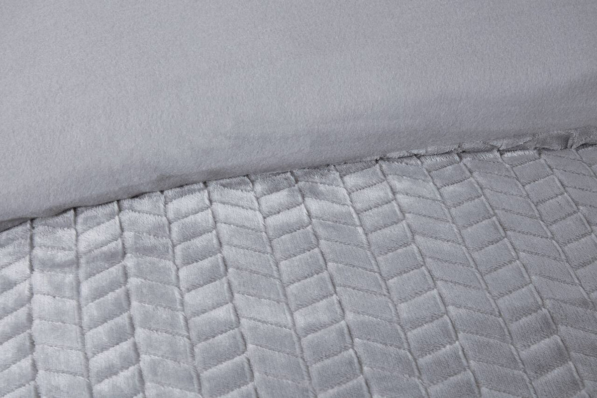 Close-up of the sculpted chevron texture on the Luxury Faux Fur duvet cover set in Silver Grey.