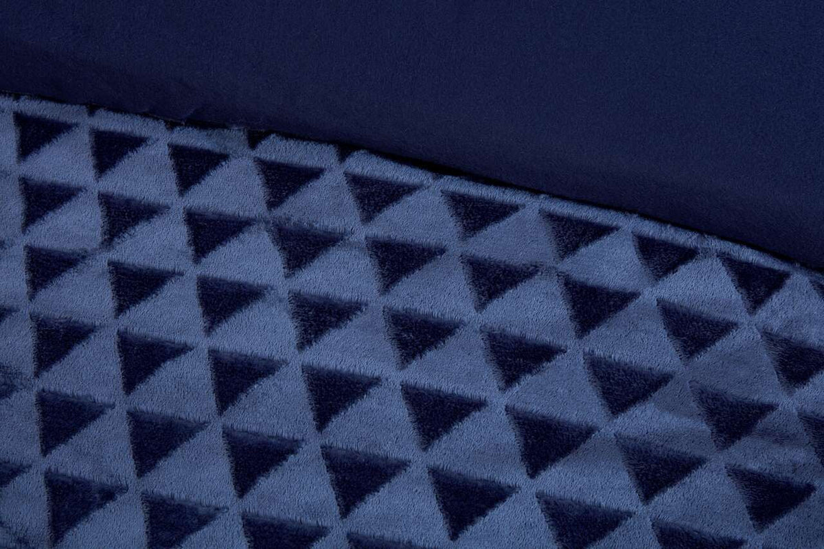 Close-up of the sculpted diamond texture on the Luxury Diamond Cut Velvet duvet cover set in Navy.