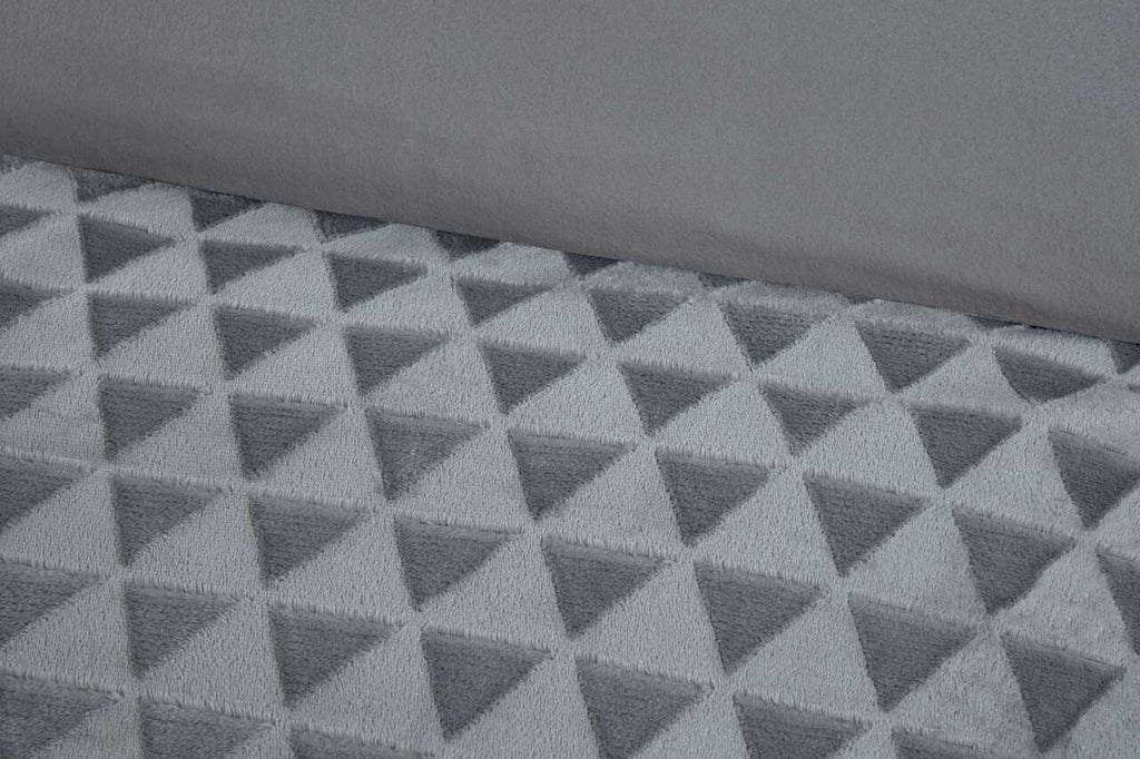 Close-up of the sculpted diamond texture on the Luxury Diamond Cut Velvet duvet cover set in Silver Grey.