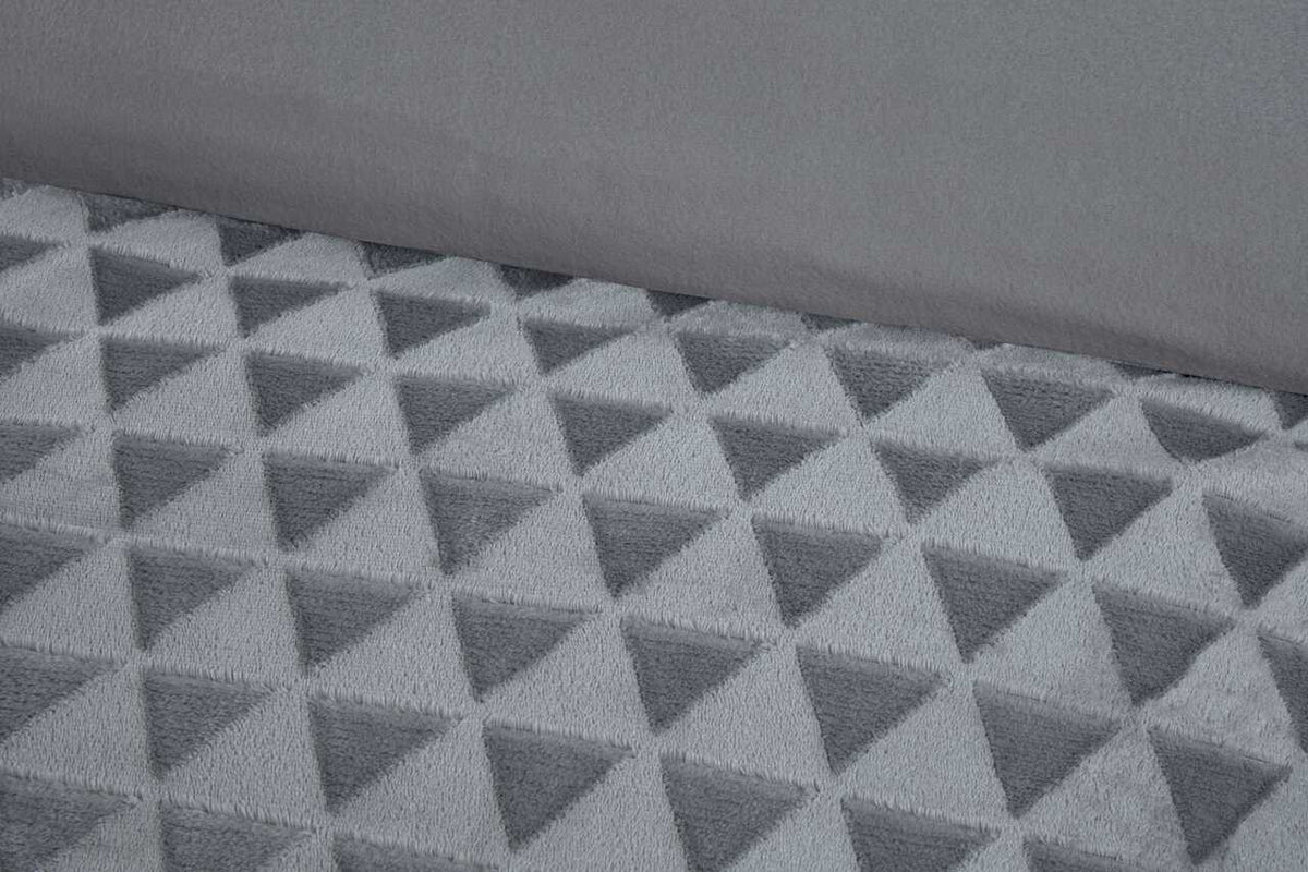 Close-up of the sculpted diamond texture on the Luxury Diamond Cut Velvet duvet cover set in Silver Grey.
