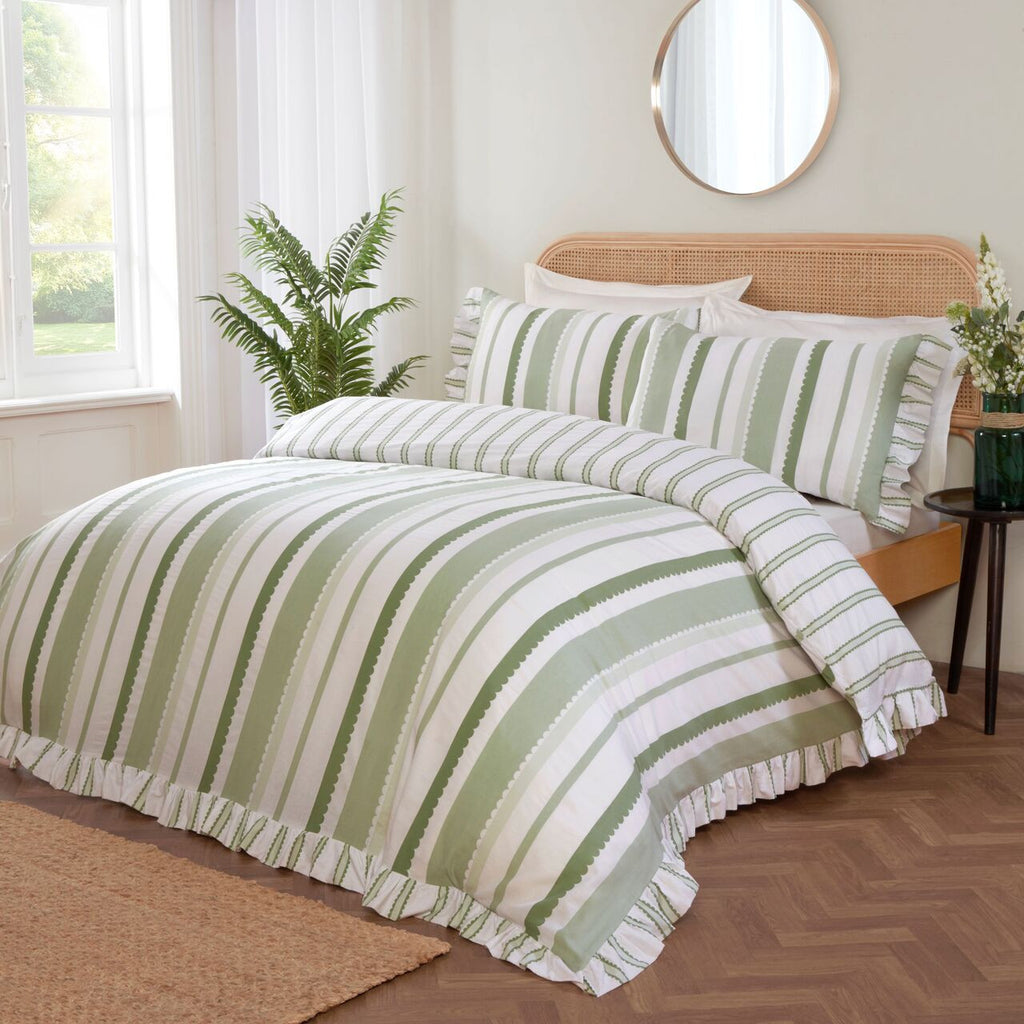 Maya Frilled reversible cotton-rich duvet cover set in green with elegant oversized frilled edging.