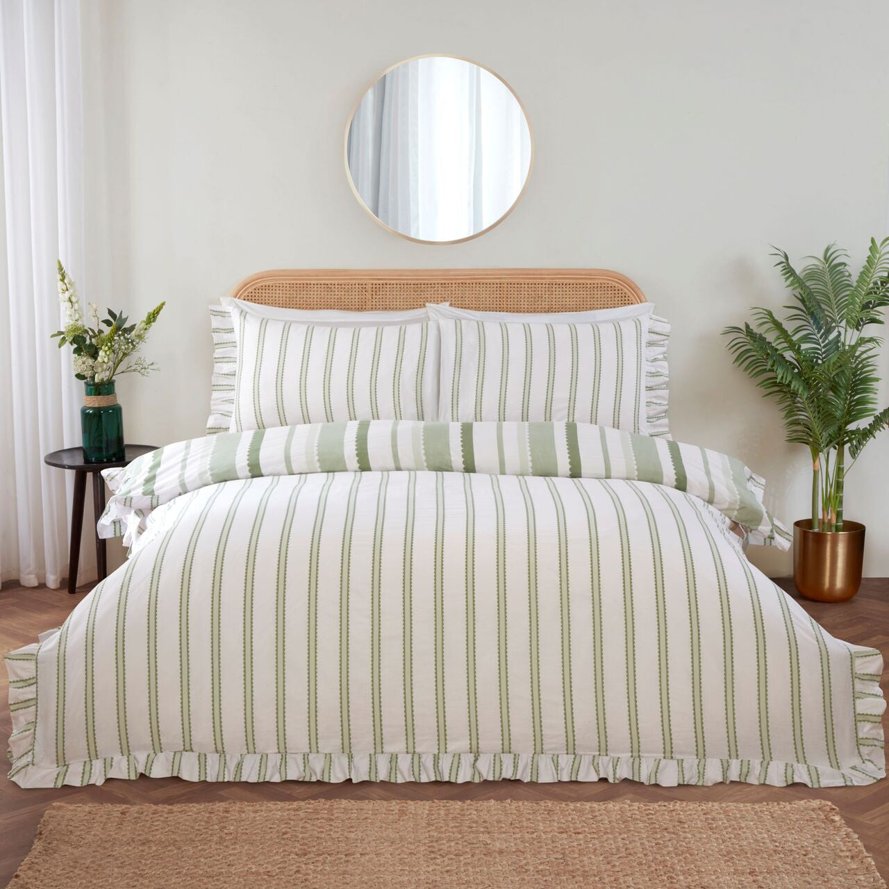 Reverse side of the Maya Frilled green duvet cover set showing the reversible design.