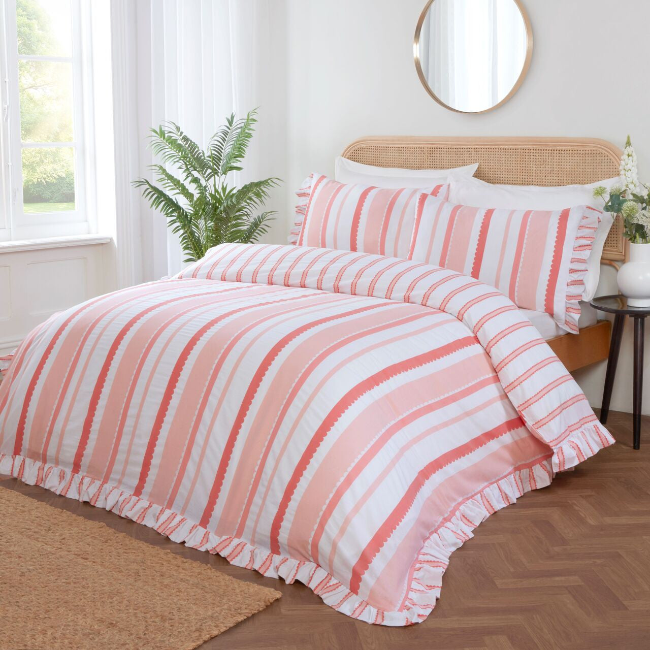 Maya Frilled reversible cotton-rich duvet cover set in pink with elegant oversized frilled edging.