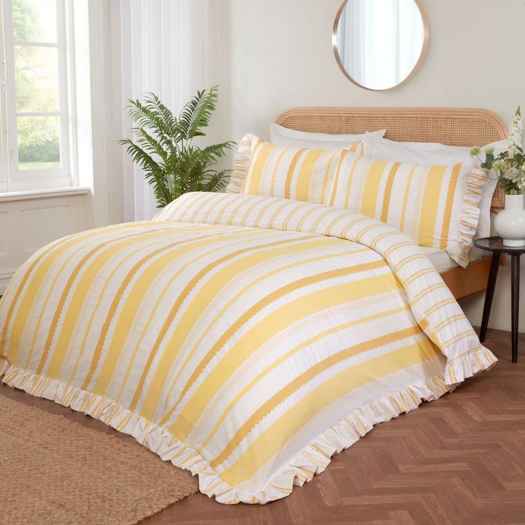 Maya Frilled reversible cotton-rich duvet cover set in yellow with elegant oversized frilled edging.