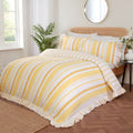 Maya Frilled reversible cotton-rich duvet cover set in yellow with elegant oversized frilled edging.