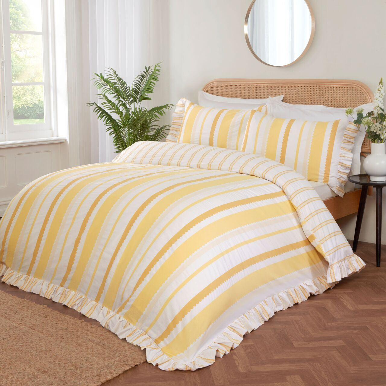 Maya Frilled reversible cotton-rich duvet cover set in yellow with elegant oversized frilled edging.