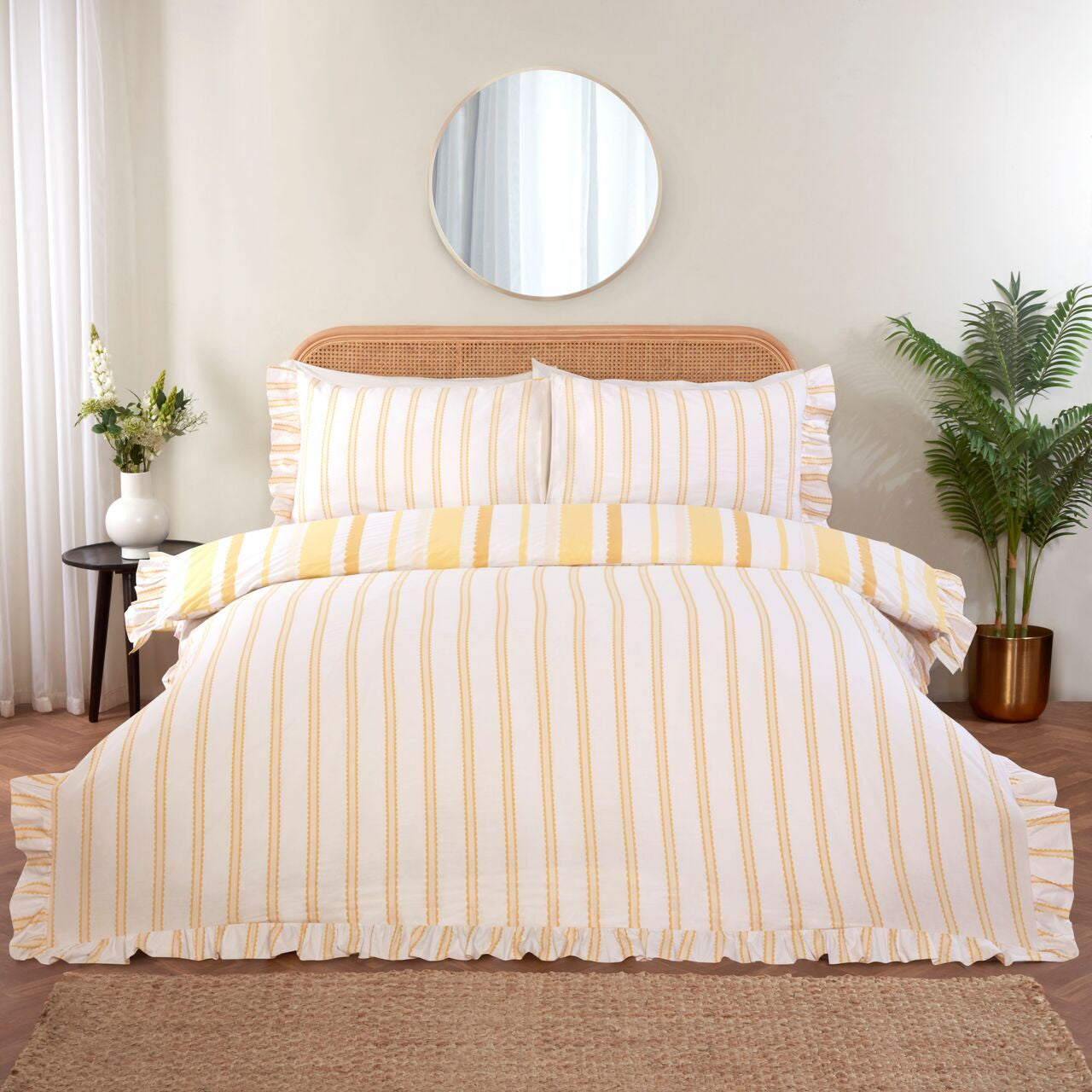 Reverse side of the Maya Frilled yellow duvet cover set showing the reversible design.
