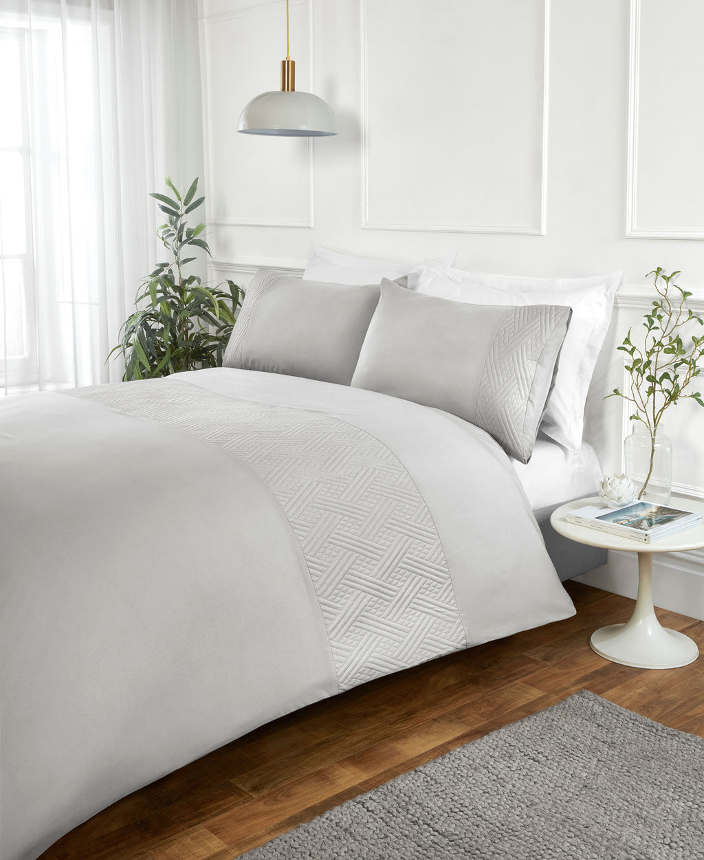 Nova Pinsonic textured duvet cover set with a contemporary geometric panel design.