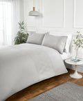 Nova Pinsonic textured duvet cover set with a contemporary geometric panel design.