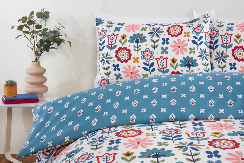 Close-up of the colourful floral print on the Olivia duvet cover set.