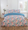 Olivia reversible floral microfibre duvet cover set with colourful folk-inspired flowers.