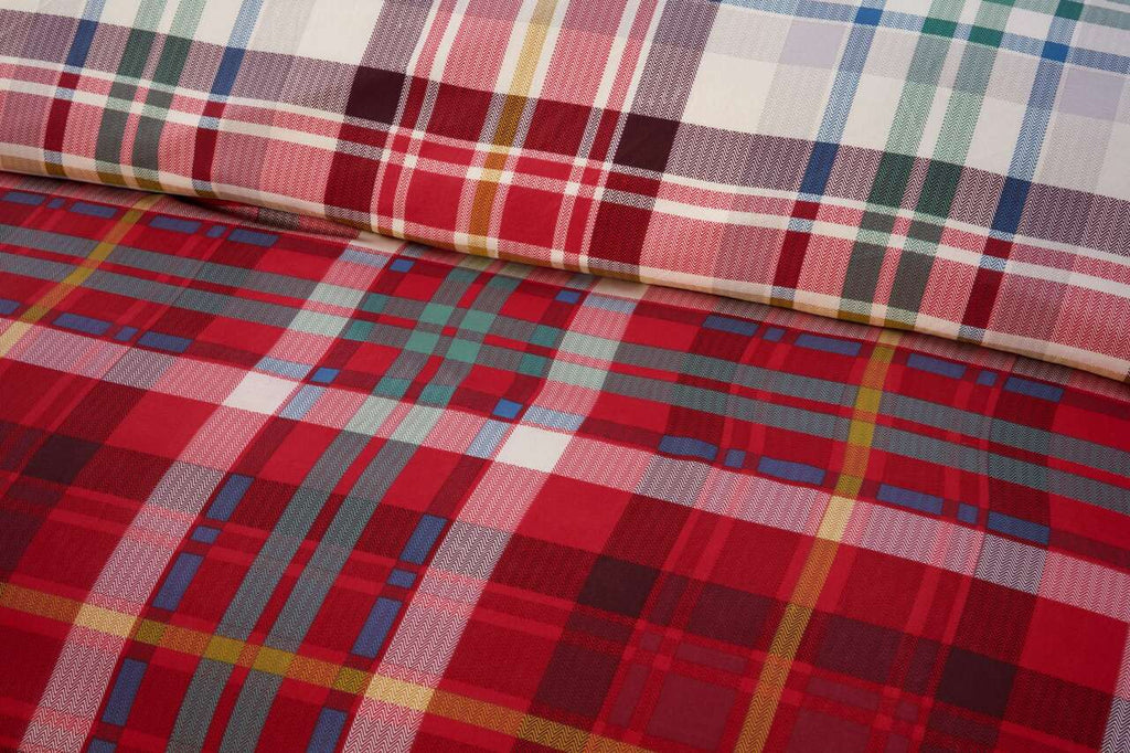 Close-up of the soft microfibre fabric on the Regalia Complete red check duvet cover set.